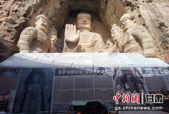時下，中國“石窟鼻祖”天梯山石窟第13窟大佛足部與局部危巖體搶救性保護項目正在施工。圖為施工現(xiàn)場。陳曉斌 攝