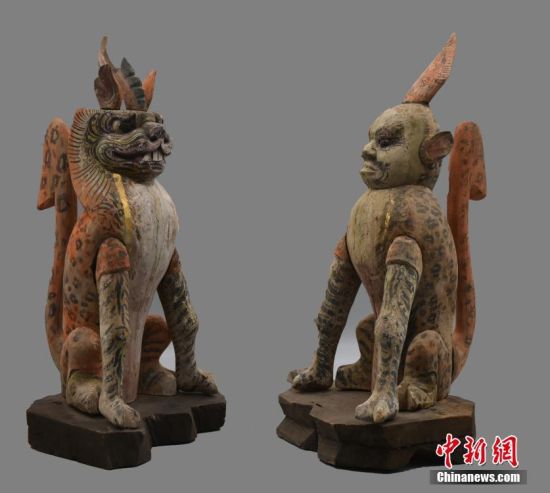 圖為慕容智墓出土鎮(zhèn)墓獸。 中新社發(fā) 甘肅省文物局 供圖